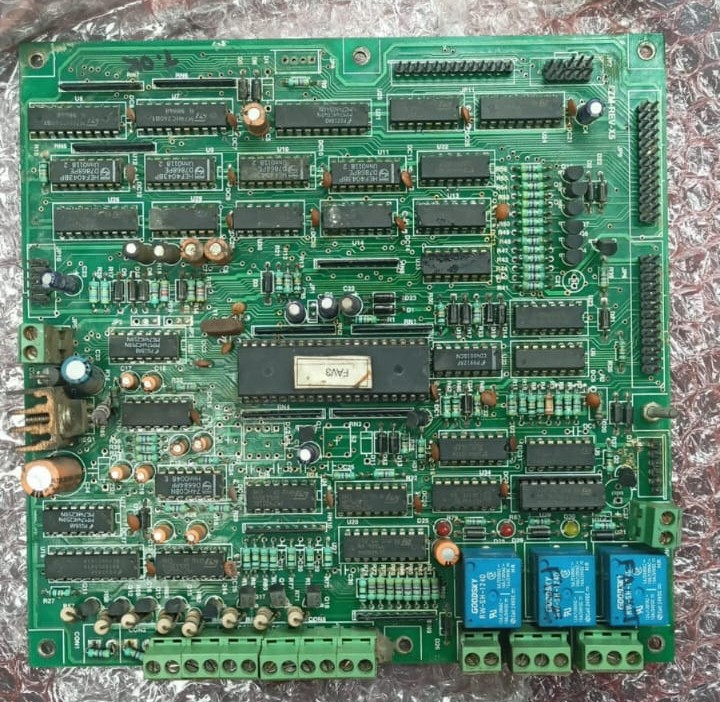 Sensor control card PCB with microcontroller, logic ICs and relay outputs repaired at E-Scedar workshop