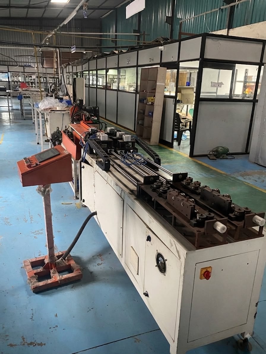 Copper and aluminium tube cutting and bending machine on the E-Scedar shop floor